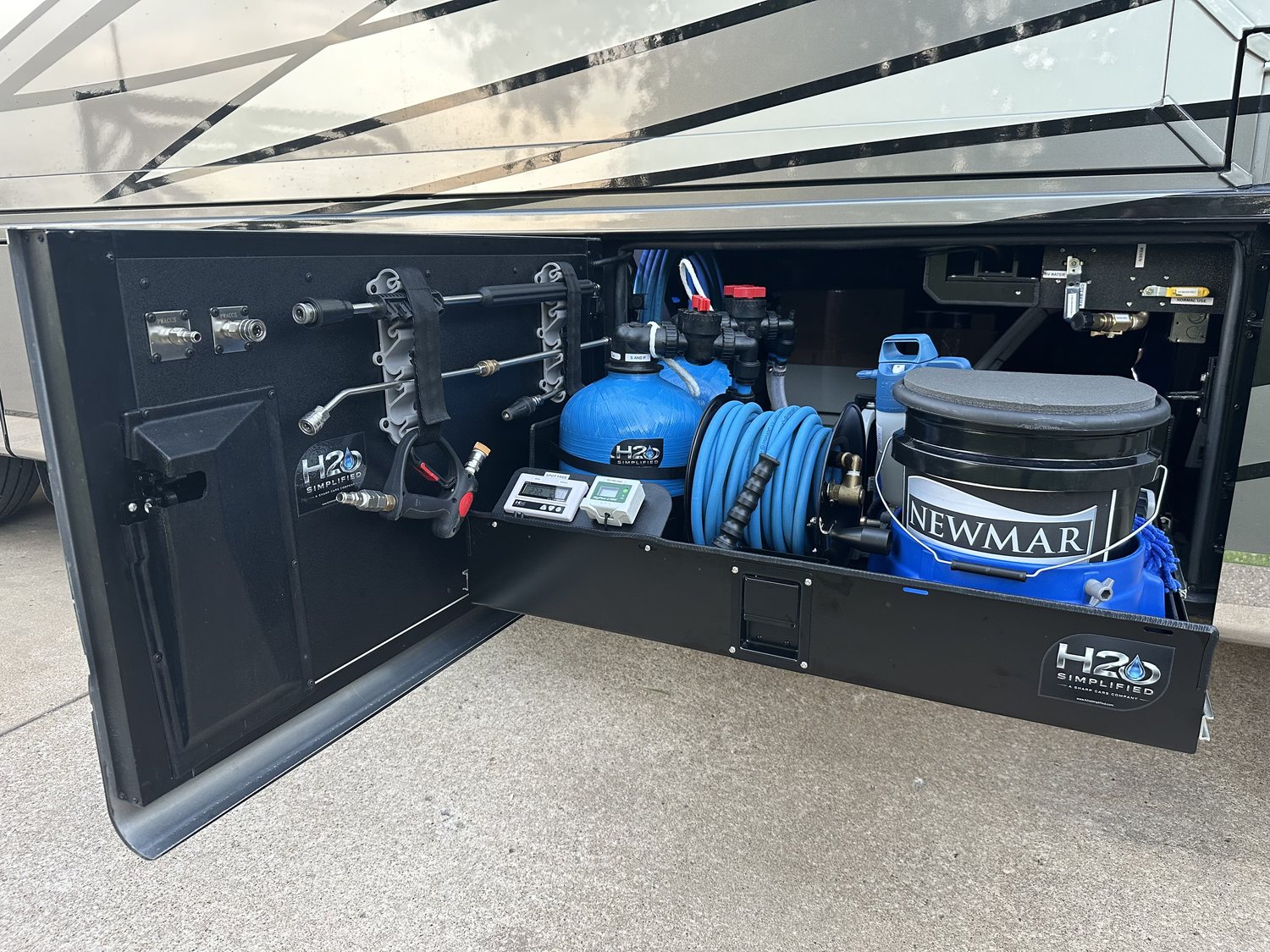 The patented H2O Simplified 3-in-1 water treatment system installed in the bay of a Newmar luxury motorhome