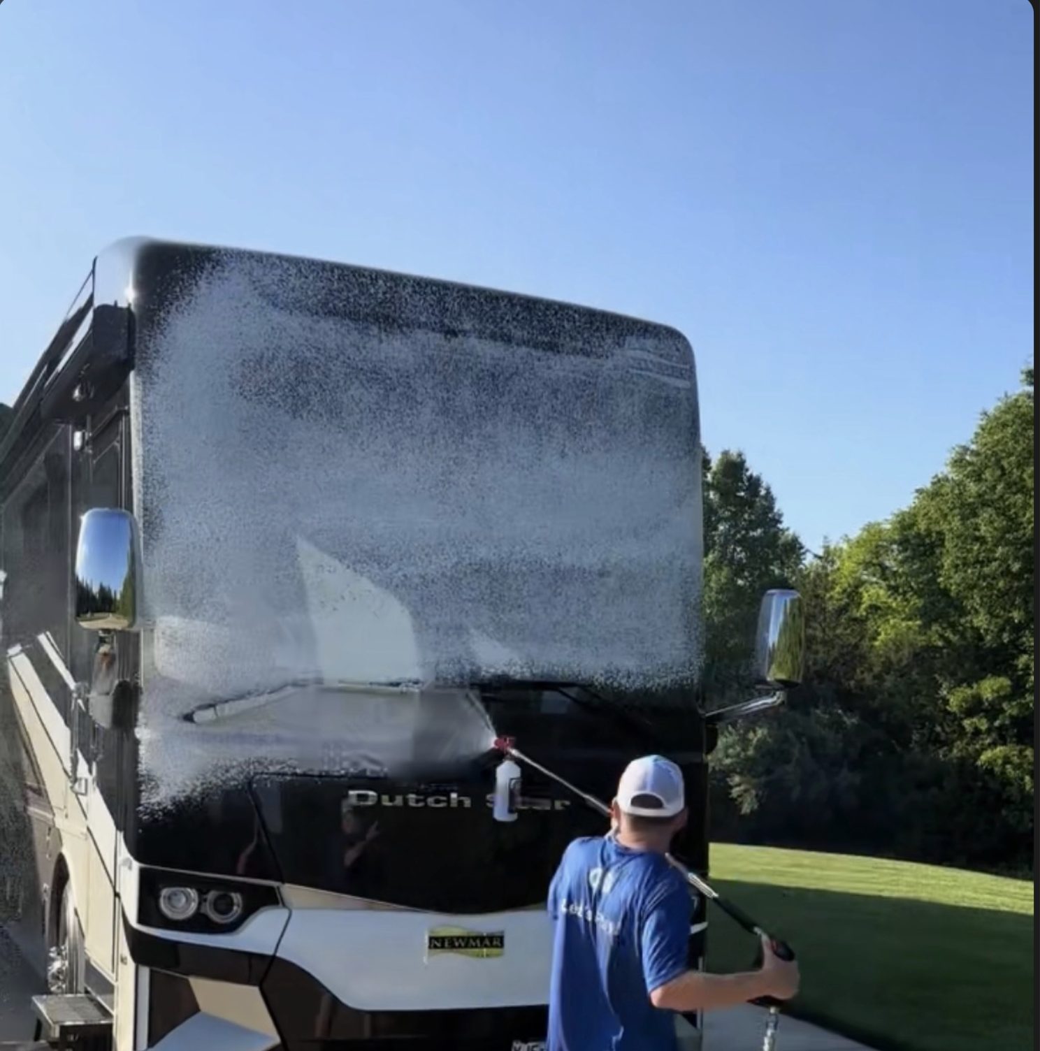 H2O Simplified spot-free foam wash in action on a Newmar Dutch Star luxury motorhome